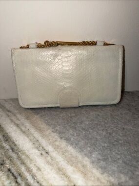 Cream Textured Wristlet Clutch with Gold Chain Strap